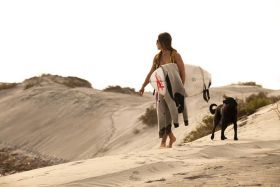 Dogs and surfing at the beach at Palacio del Mar, Rosarito Beach, Baja Mexico – Best Places In The World To Retire – International Living